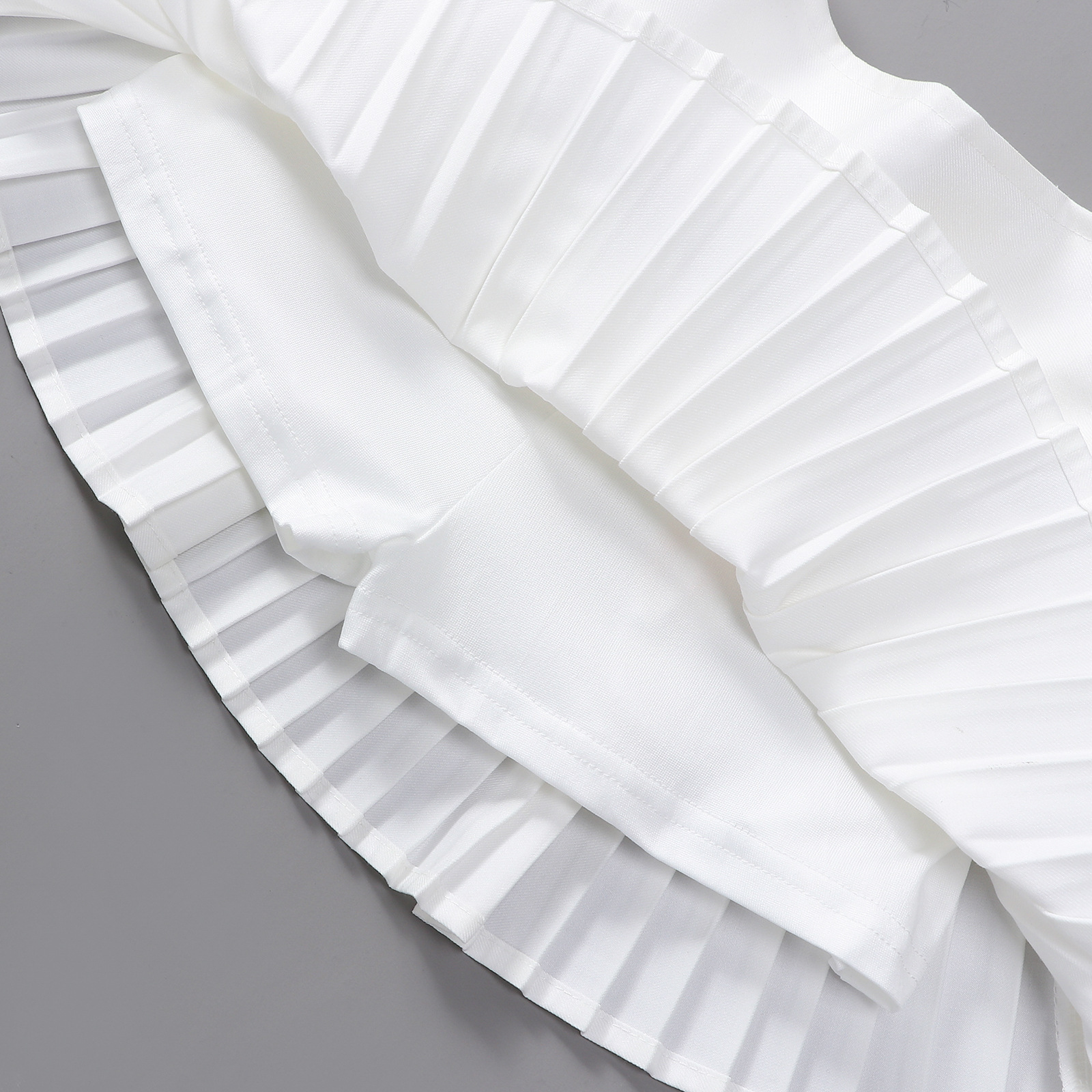 กระโปรง เด็กผู้หญิง อัดพลีส สีพื้นแยกสร้อม**พร้อมแบบโบว์ชมพู