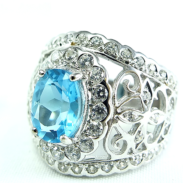 แหวนเงินแท้ราคาถูกชุบทองคำขาว สวิสบลูโทปาซแท้ 2.25 กะรัต เพชรCZ 1.09 กะรัต งานประณีตสวยงาม สั่งผลิตค่ะ