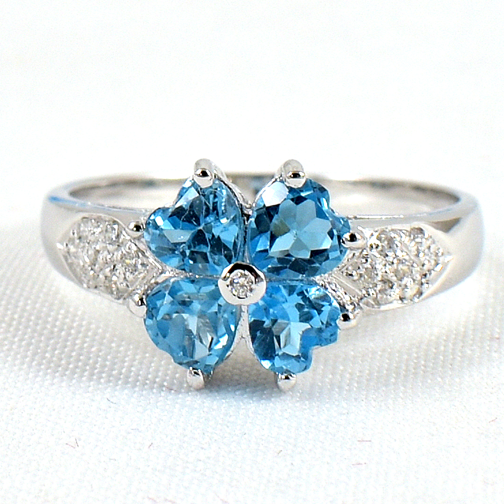 แหวนเงินแท้ราคาถูกชุบทองคำขาว สวิสบลูโทปาซแท้ 1.40 กะรัต เพชรCZ 0.15 กะรัต งานประณีตสวยงาม สั่งผลิตค่ะ