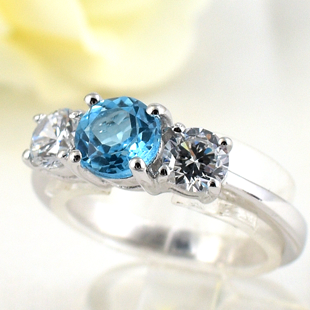 แหวนเงินแท้ราคาถูกชุบทองคำขาว สวิสบลูโทปาซแท้ 0.76 กะรัต เพชรCZ 0.50 กะรัต งานประณีตสวยงาม สั่งผลิตค่ะ