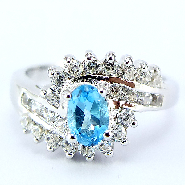 แหวนเงินแท้ราคาถูกชุบทองคำขาว สวิสบลูโทปาซแท้ 0.54 กะรัต เพชรCZ 0.60 กะรัต งานประณีตสวยงาม สั่งผลิตค่ะ