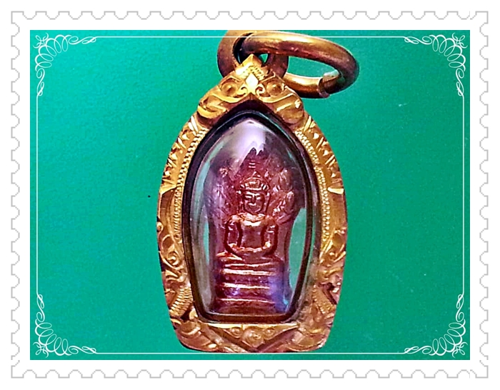 เหรียญนาคปรก ใบมะขาม อาจารย์นอง วัดทรายขาว จ.ปัตตานี เลี่ยมทองคำยกซุ้มหนาๆ