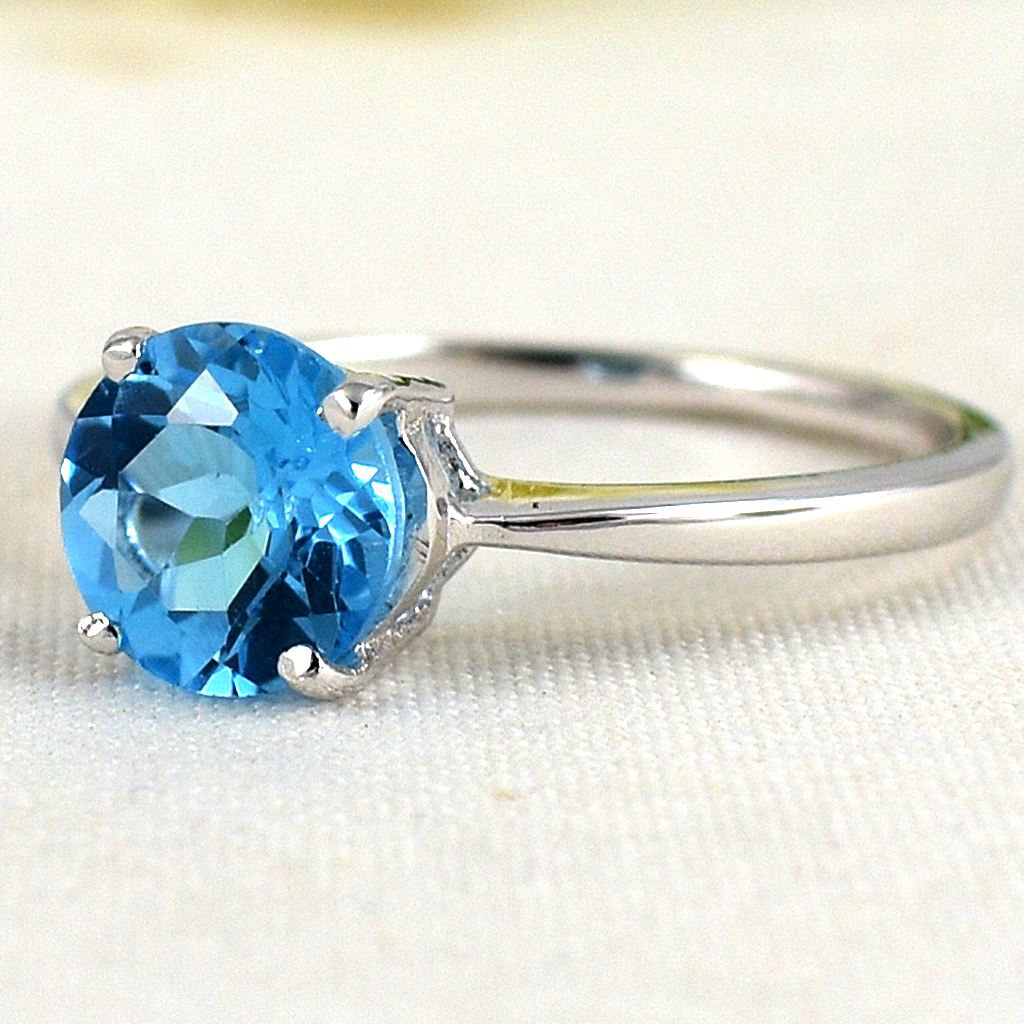 แหวนเงินแท้ราคาถูกชุบทองคำขาว สวิสบลูโทปาซแท้ 1.65 กะรัต งานประณีตสวยงาม สั่งผลิตค่ะ