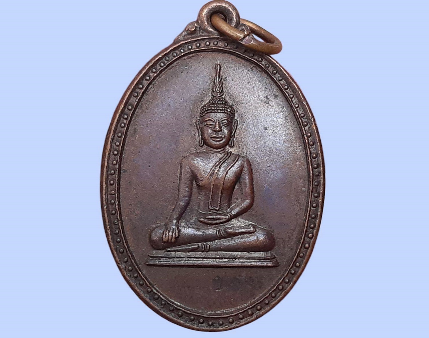 เหรียญ พระแก้วโกเมน พระประธาน วัดมณีวนาราม จ.อุบลราชธานี รุ่นแรก ปี 2519 พระประธานประจำอุโบสถ วัดมณีวนาราม (วัดป่าน้อย) จ.อุบลราชธานี