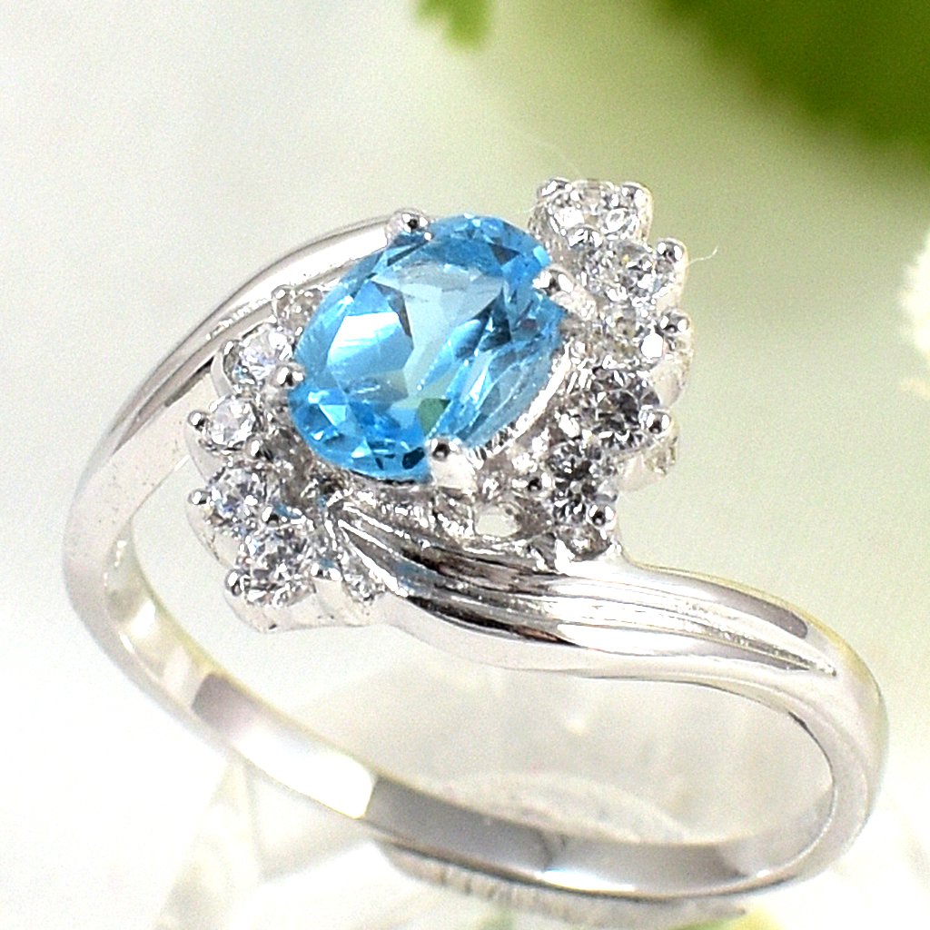 แหวนเงินแท้ราคาถูกชุบทองคำขาว สวิสบลูโทปาซแท้ 1.05 กะรัต เพชรCZ 0.10 กะรัต งานประณีตสวยงาม สั่งผลิตค่ะ