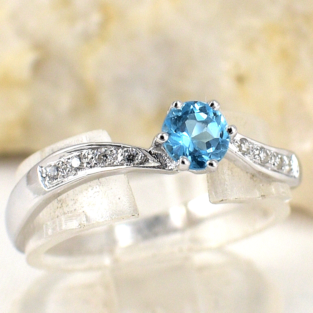 แหวนเงินแท้ราคาถูกชุบทองคำขาว สวิสบลูโทปาซแท้ 0.35 กะรัต เพชรCZ 0.056 กะรัต งานประณีตสวยงาม สั่งผลิตค่ะ