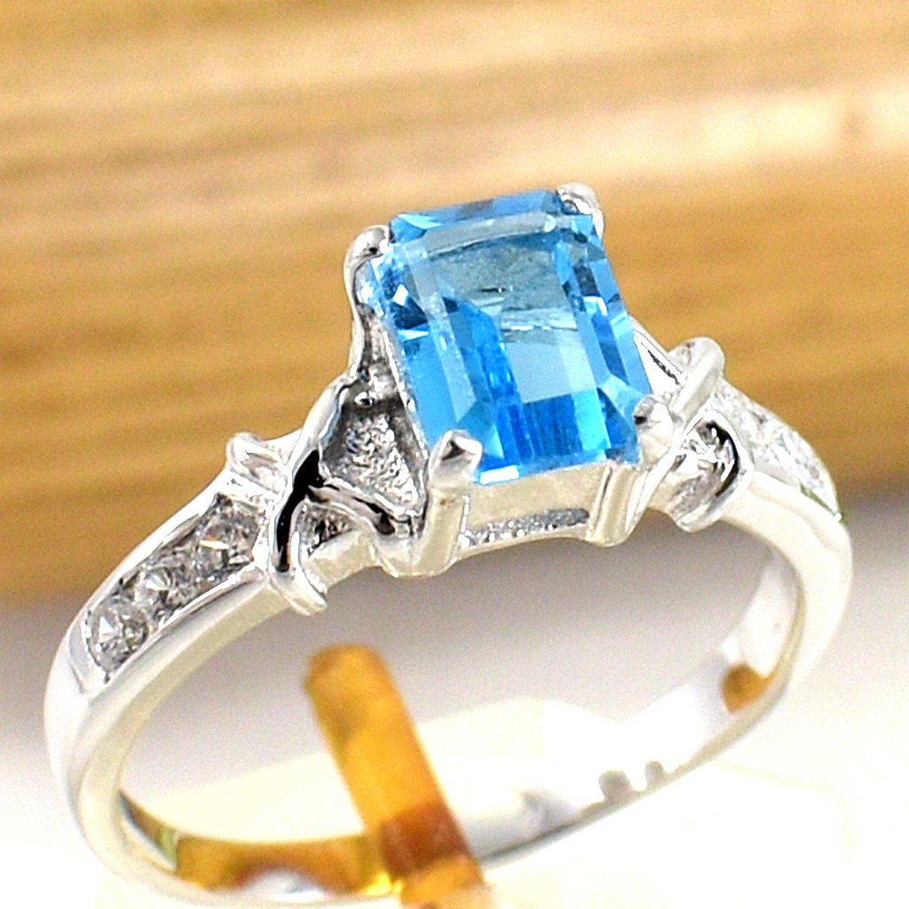 แหวนเงินแท้ราคาถูกชุบทองคำขาว สวิสบลูโทปาซแท้ 1.25 กะรัต เพชรCZ 0.18 กะรัต งานประณีตสวยงาม สั่งผลิตค่ะ