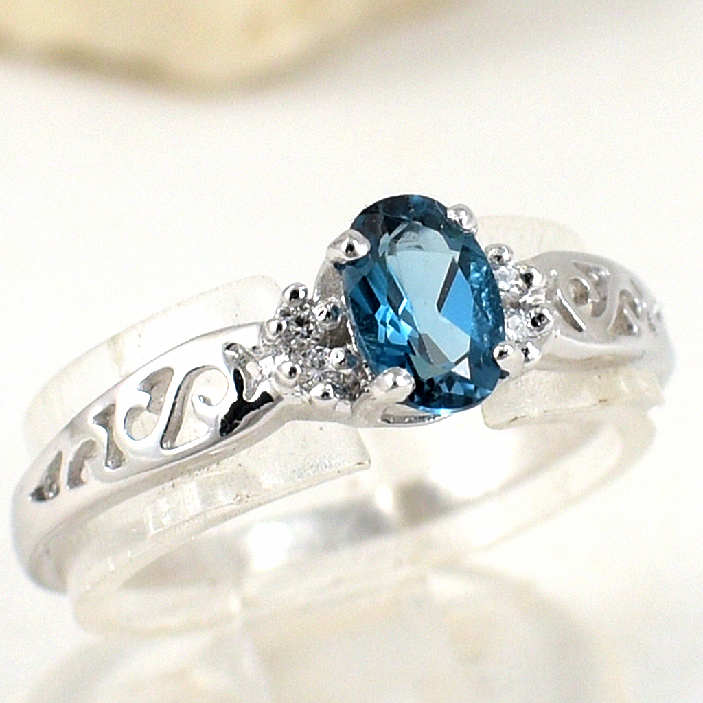 แหวนเงินแท้ราคาถูกชุบทองคำขาว ลอนดอนบลูโทปาซแท้ 0.55 กะรัต เพชรCZ 0.09 กะรัต งานประณีตสวยงาม สั่งผลิตค่ะ