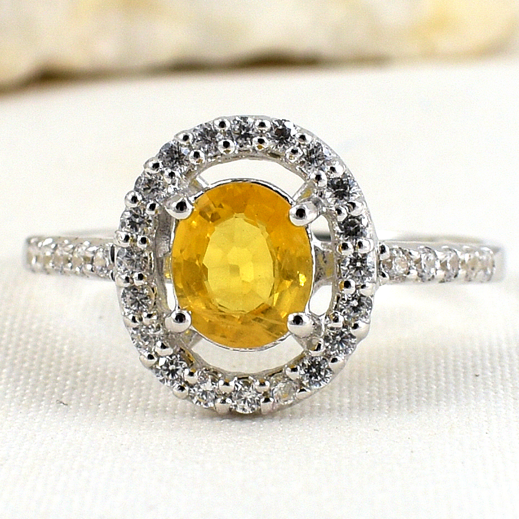 แหวนเงินแท้ราคาถูกชุบทองคำขาว บุษราคัมแท้ 0.95 กะรัต เพชรCZ 0.30 กะรัต งานประณีตสวยงาม สั่งผลิตค่ะ