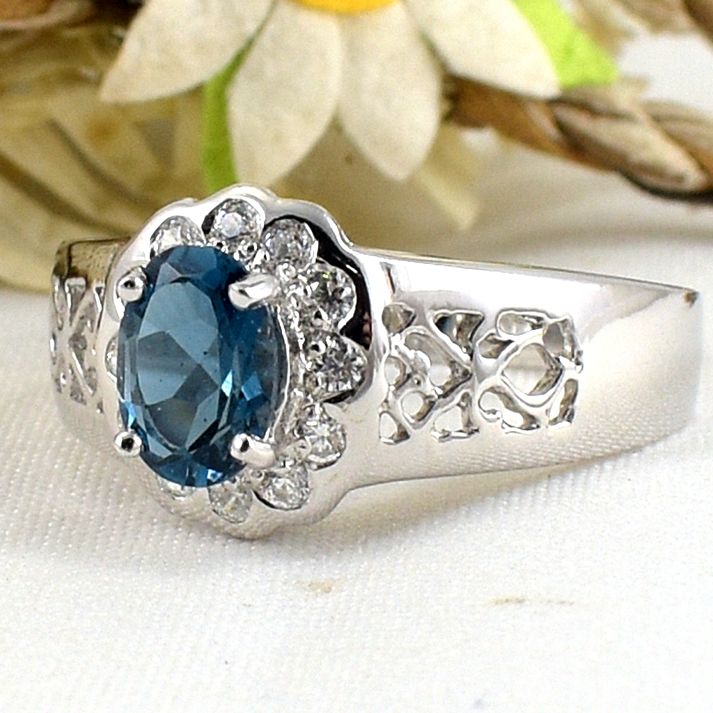 แหวนเงินแท้ราคาถูกชุบทองคำขาว ลอนดอนบลูโทปาซแท้ 0.95 กะรัต เพชรCZ 0.18 กะรัต งานประณีตสวยงาม สั่งผลิตค่ะ