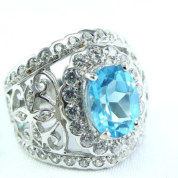 แหวนเงินแท้ราคาถูกชุบทองคำขาว สวิสบลูโทปาซแท้ 2.25 กะรัต เพชรCZ 1.09 กะรัต งานประณีตสวยงาม สั่งผลิตค่ะ