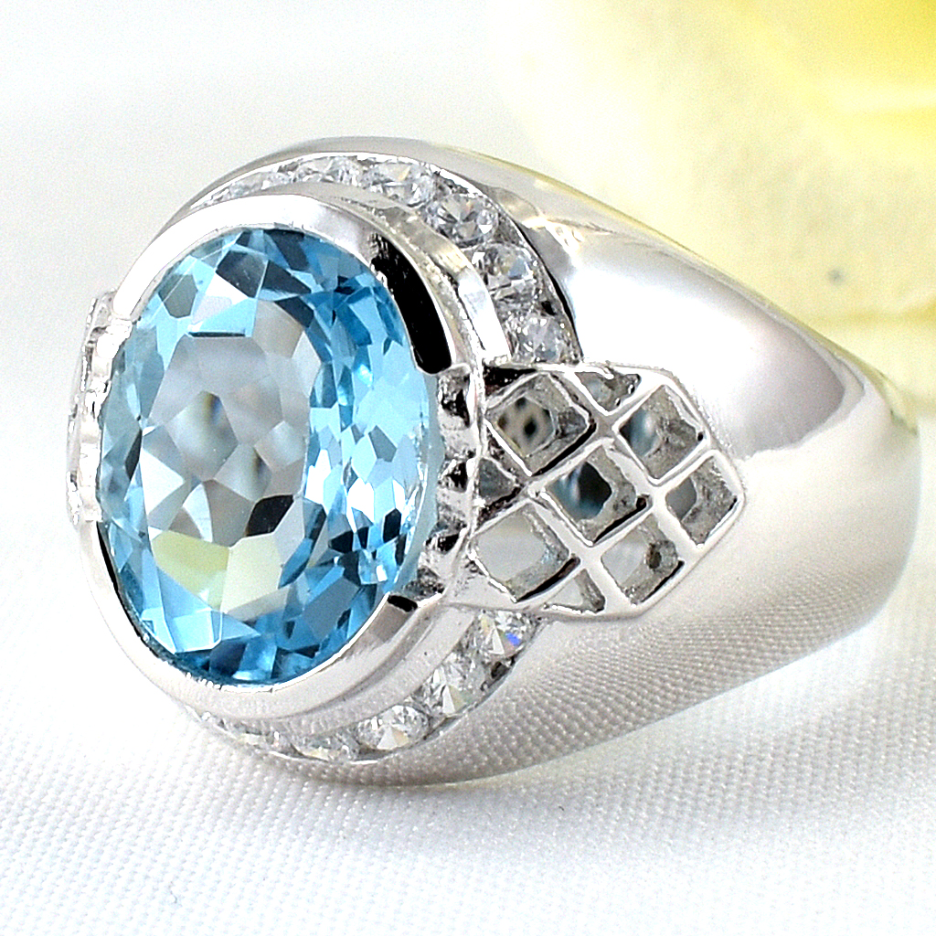 แหวนเงินแท้ราคาถูกชุบทองคำขาว สกายบลูโทปาซแท้ 5.75 กะรัต เพชรCZ 0.48 กะรัต งานประณีตสวยงาม สั่งผลิตค่ะ