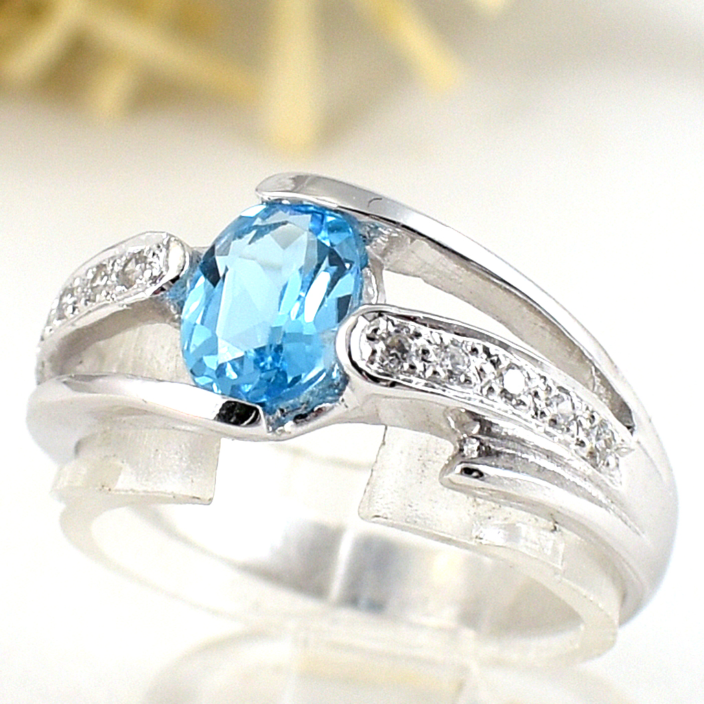 แหวนเงินแท้ราคาถูกชุบทองคำขาว สวิสบลูโทปาซแท้ 0.95 กะรัต เพชรCZ 0.13 กะรัต งานประณีตสวยงาม สั่งผลิตค่ะ