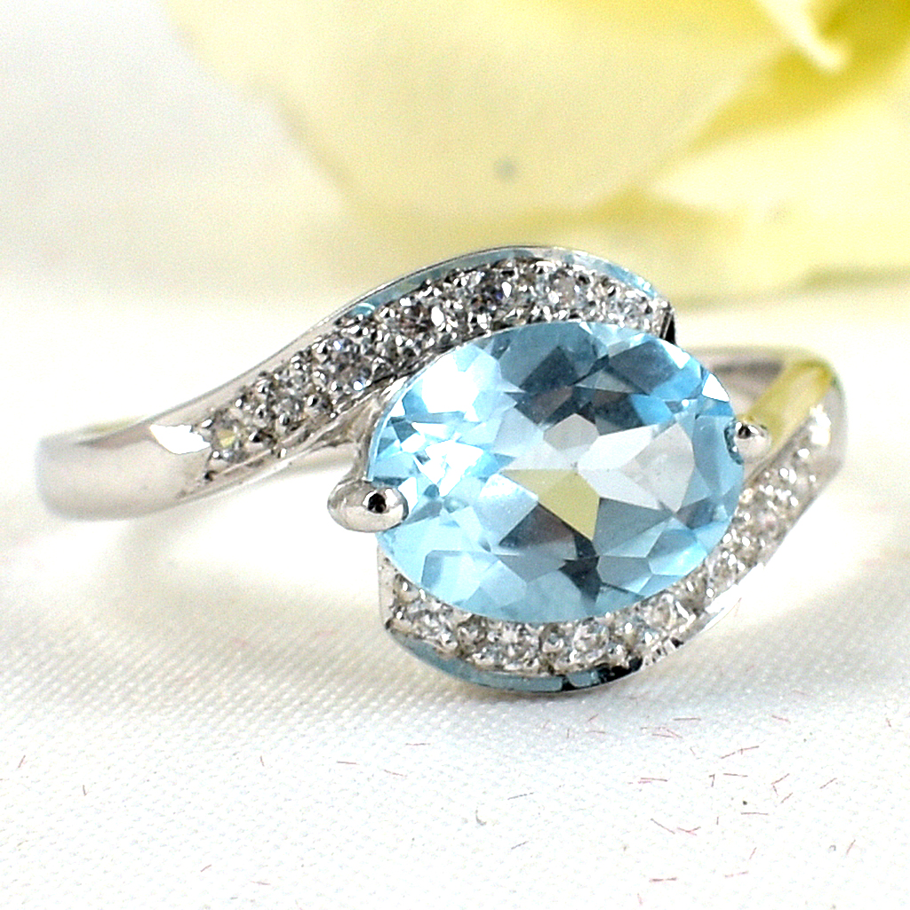 แหวนเงินแท้ราคาถูกชุบทองคำขาว สกายบลูโทปาซแท้ 2.29 กะรัต เพชรCZ 0.14 กะรัต งานประณีตสวยงาม สั่งผลิตค่ะ