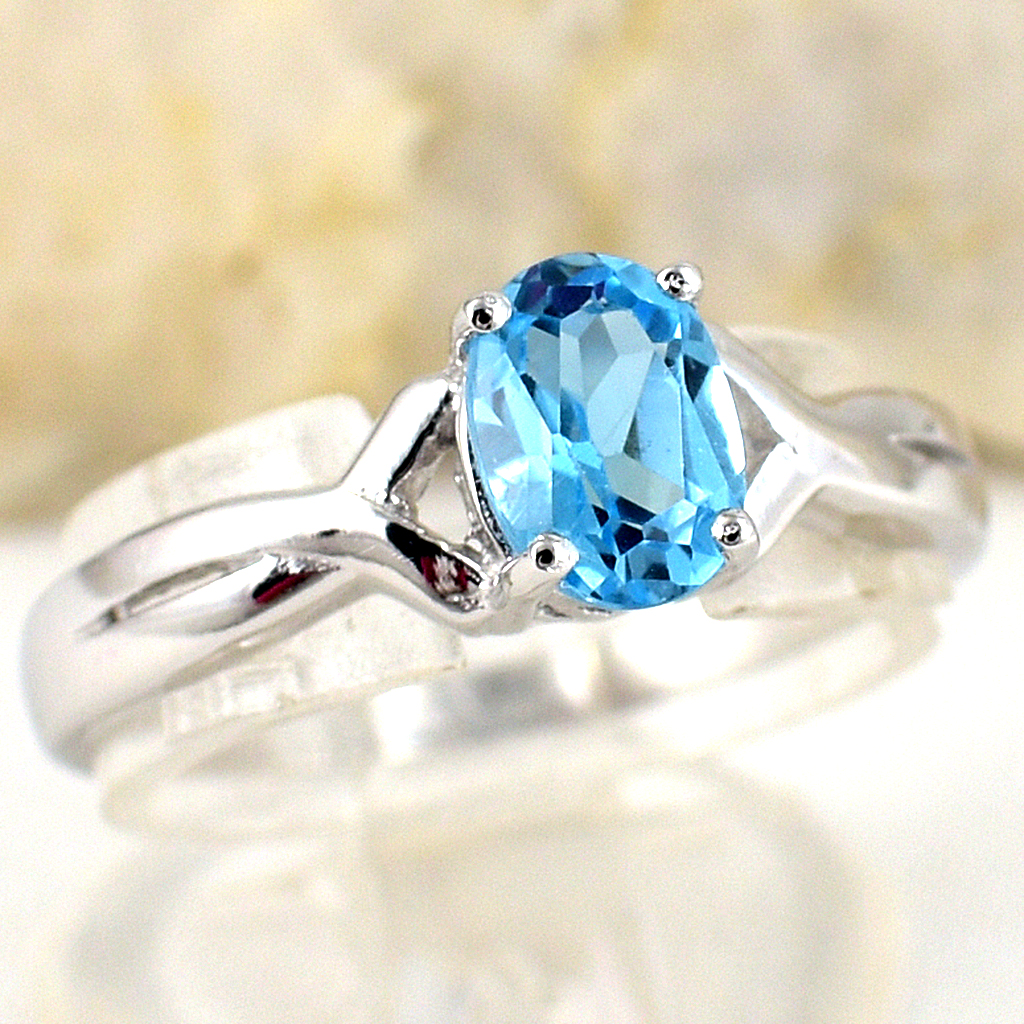 แหวนเงินแท้ราคาถูกชุบทองคำขาว สวิสบลูโทปาซแท้ 0.95 กะรัต งานประณีตสวยงาม สั่งผลิตค่ะ