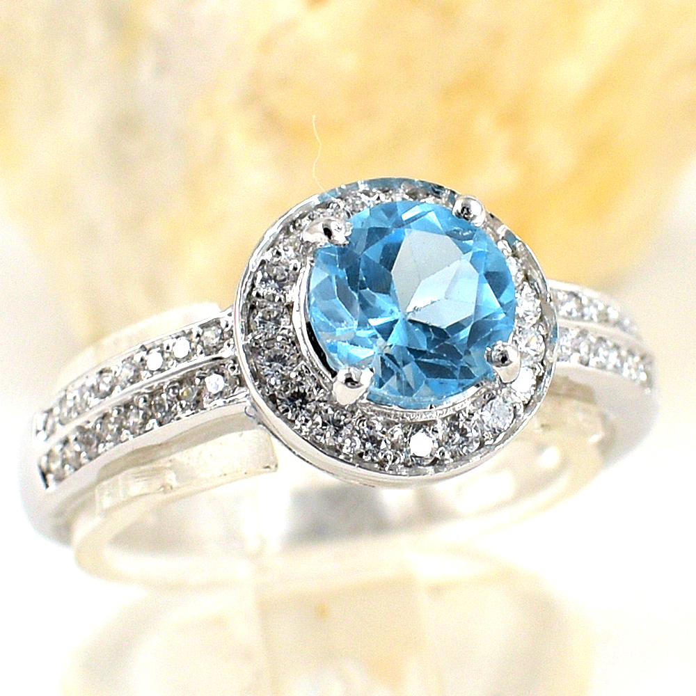 แหวนเงินแท้ราคาถูกชุบทองคำขาว สวิสบลูโทปาซแท้ 1.65 กะรัต เพชรCZ 0.51 กะรัต งานประณีตสวยงาม สั่งผลิตค่ะ