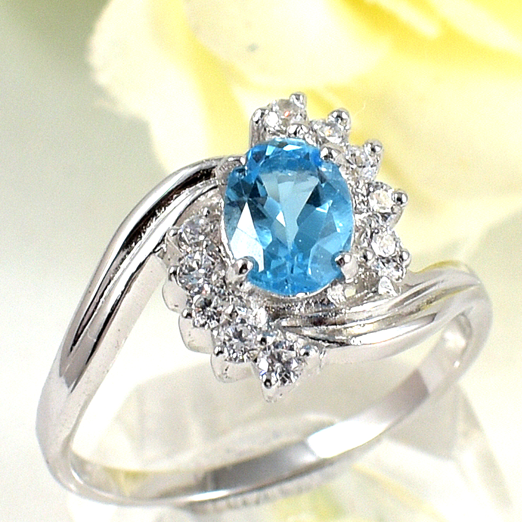 แหวนเงินแท้ราคาถูกชุบทองคำขาว สวิสบลูโทปาซแท้ 1.05 กะรัต เพชรCZ 0.10 กะรัต งานประณีตสวยงาม สั่งผลิตค่ะ