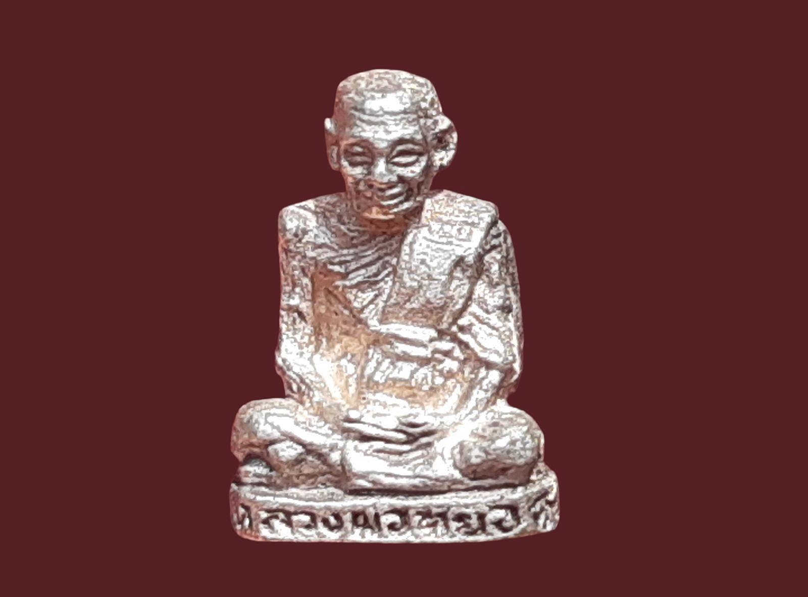 รูปเหมือนหล่อ หลวงพ่อหยอด วัดแก้วเจริญ พิมพ์จิ๋ว (หล่นหาย) อายุ 84 ปี 2538 เนื้อเงิน