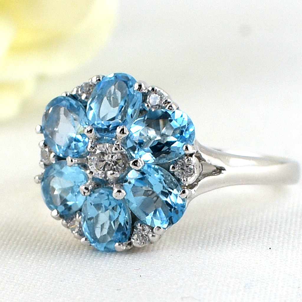 แหวนเงินแท้ราคาถูกชุบทองคำขาว สวิสบลูโทปาซแท้ 2.04 กะรัต เพชรCZ 0.41 กะรัต งานประณีตสวยงาม สั่งผลิตค่ะ