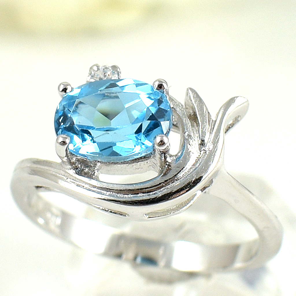 แหวนเงินแท้ราคาถูกชุบทองคำขาว สวิสบลูโทปาซแท้ 1.85 กะรัต เพชรCZ 0.04 กะรัต งานประณีตสวยงาม สั่งผลิตค่ะ