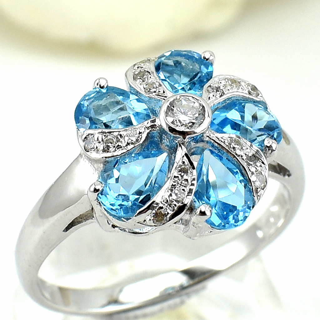 แหวนเงินแท้ราคาถูกชุบทองคำขาว สวิสบลูโทปาซแท้ 1.95 กะรัต เพชรCZ 0.165 กะรัต งานประณีตสวยงาม สั่งผลิตค่ะ