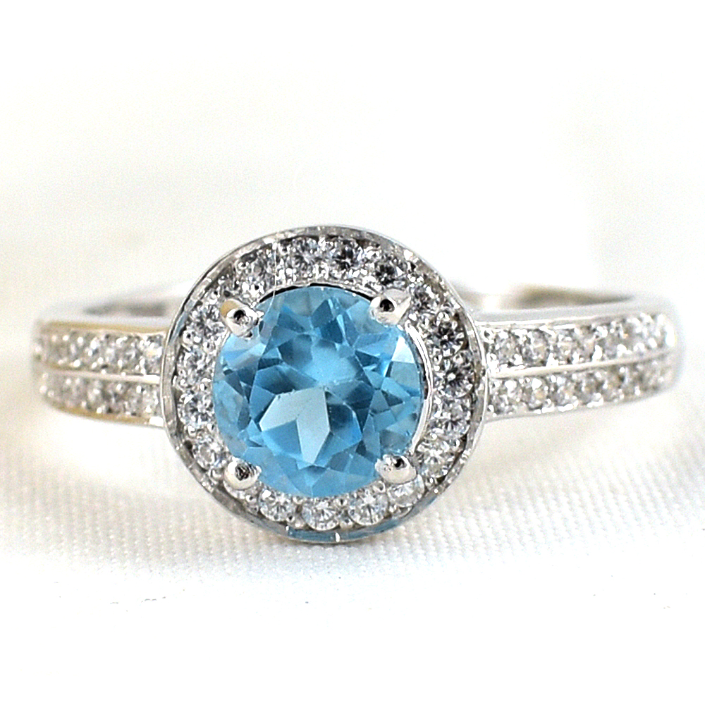 แหวนเงินแท้ราคาถูกชุบทองคำขาว สวิสบลูโทปาซแท้ 1.65 กะรัต เพชรCZ 0.51 กะรัต งานประณีตสวยงาม สั่งผลิตค่ะ