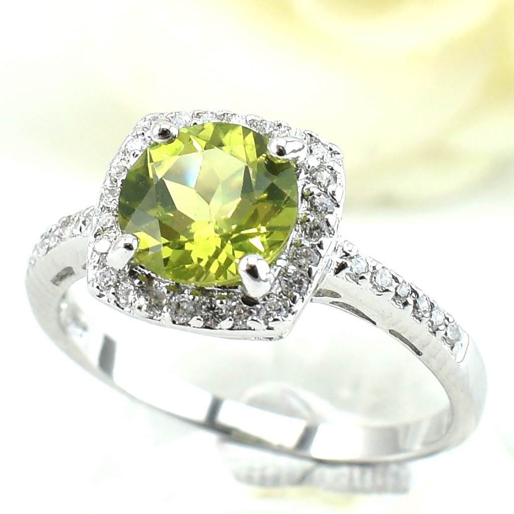 แหวนเงินแท้ราคาถูกชุบทองคำขาว เพอริดอทแท้ 1.65 กะรัต เพชรCZ 0.252 กะรัต งานประณีตสวยงาม สั่งผลิตค่ะ