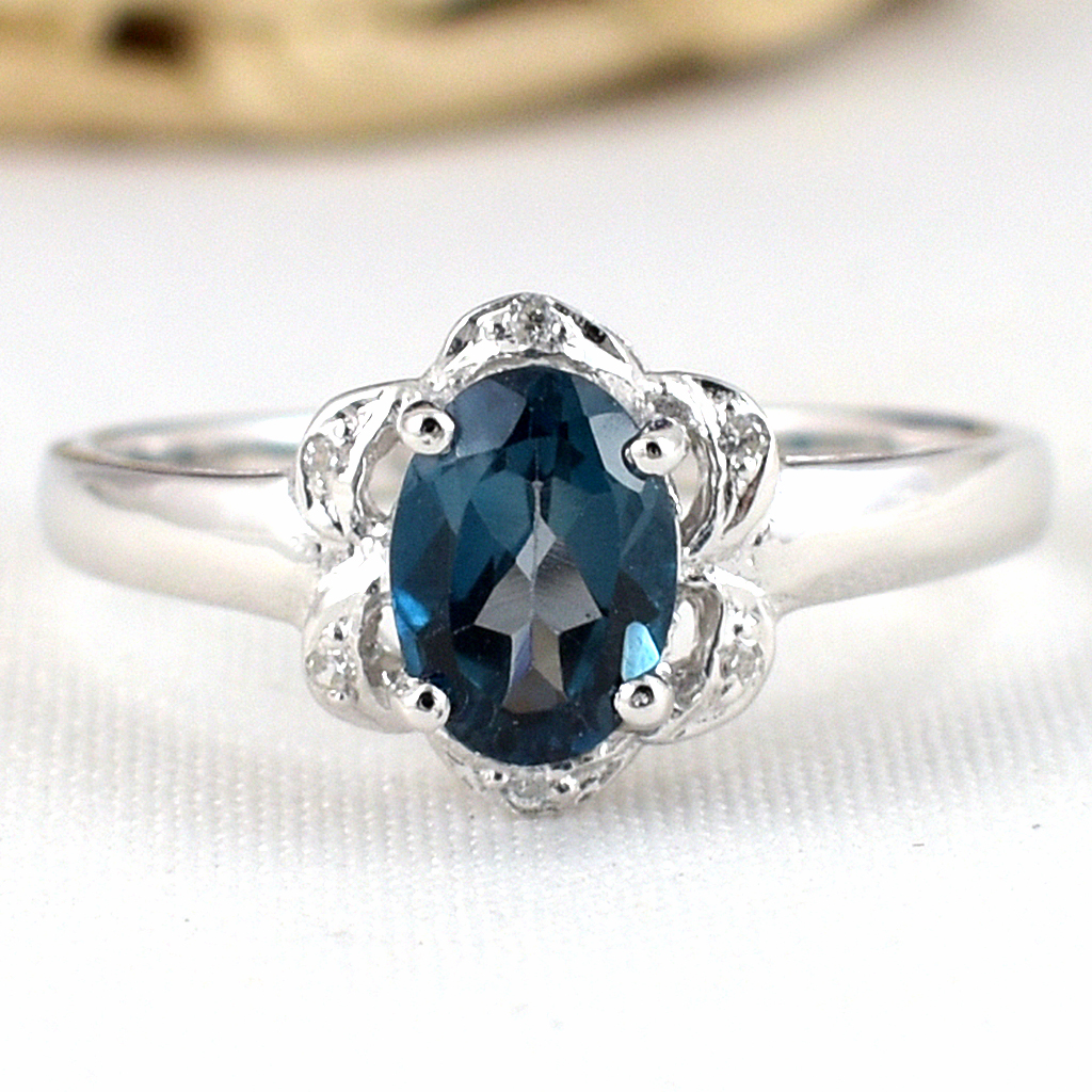 แหวนเงินแท้ราคาถูกชุบทองคำขาว ลอนดอนบลูโทปาซแท้ 0.95 กะรัต เพชรCZ 0.06 กะรัต งานประณีตสวยงาม สั่งผลิตค่ะ