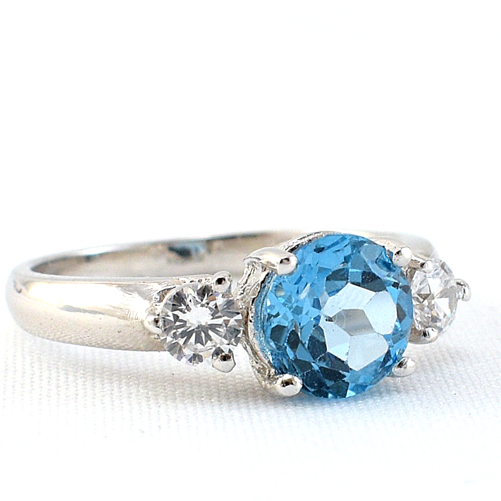 แหวนเงินแท้ราคาถูกชุบทองคำขาว สวิสบลูโทปาซแท้ 1.55 กะรัต เพชรCZ 0.030 กะรัต งานประณีตสวยงาม สั่งผลิตค่ะ