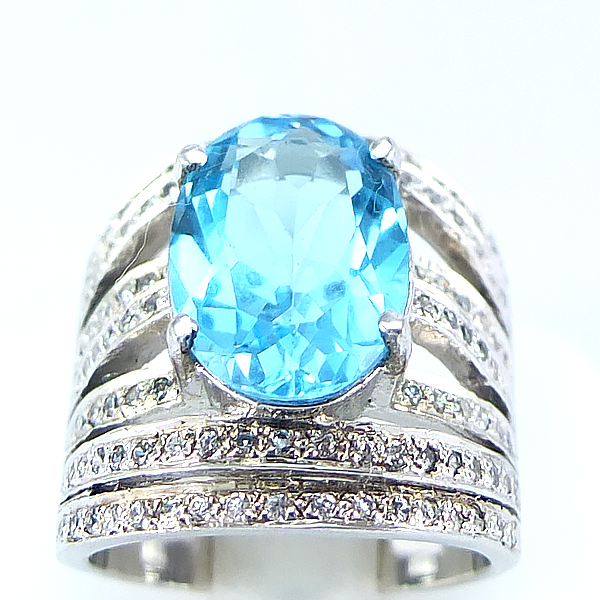 แหวนเงินแท้ราคาถูกชุบทองคำขาว สวิสบลูโทปาซแท้ 8.80 กะรัต เพชรCZ 1.10 กะรัต งานประณีตสวยงาม สั่งผลิตค่ะ