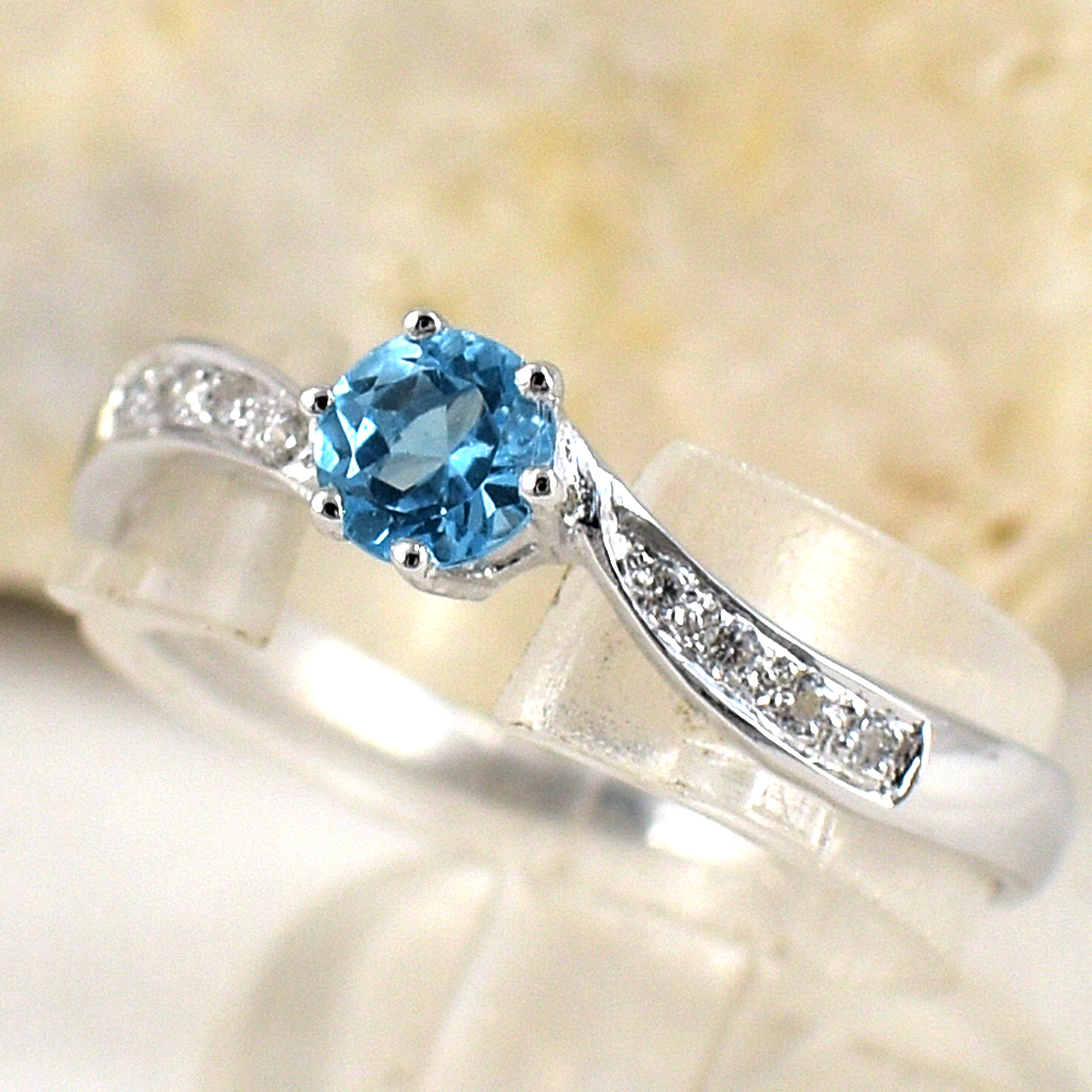 แหวนเงินแท้ราคาถูกชุบทองคำขาว สวิสบลูโทปาซแท้ 0.35 กะรัต เพชรCZ 0.056 กะรัต งานประณีตสวยงาม สั่งผลิตค่ะ