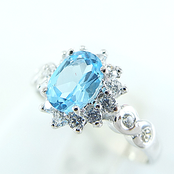 แหวนเงินแท้ราคาถูกชุบทองคำขาว สวิสบลูโทปาซแท้ 0.95 กะรัต เพชรCZ 0.40 กะรัต งานประณีตสวยงาม สั่งผลิตค่ะ