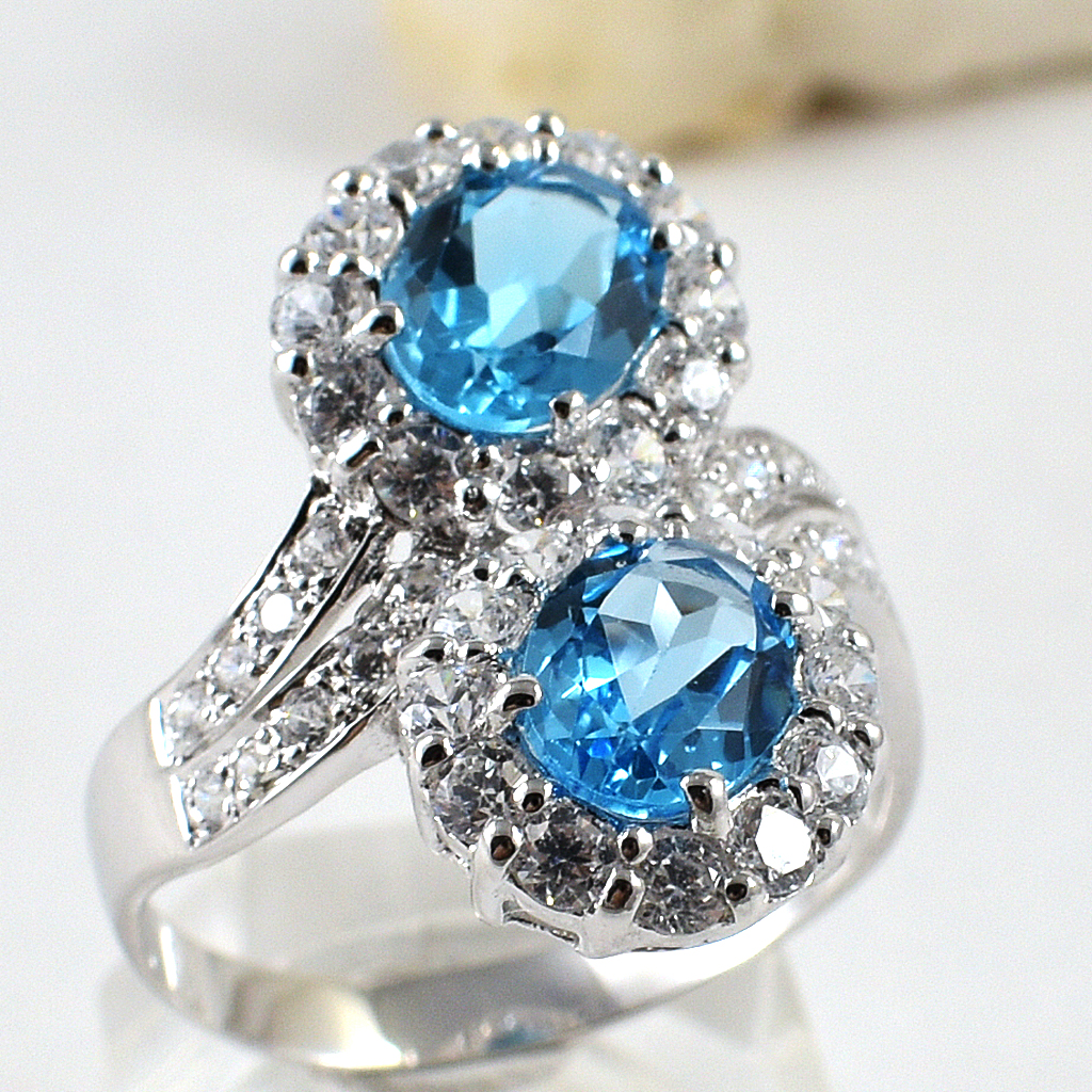 แหวนเงินแท้ราคาถูกชุบทองคำขาว สวิสบลูโทปาซแท้ 3.70 กะรัต เพชรCZ 1.23 กะรัต งานประณีตสวยงาม สั่งผลิตค่ะ