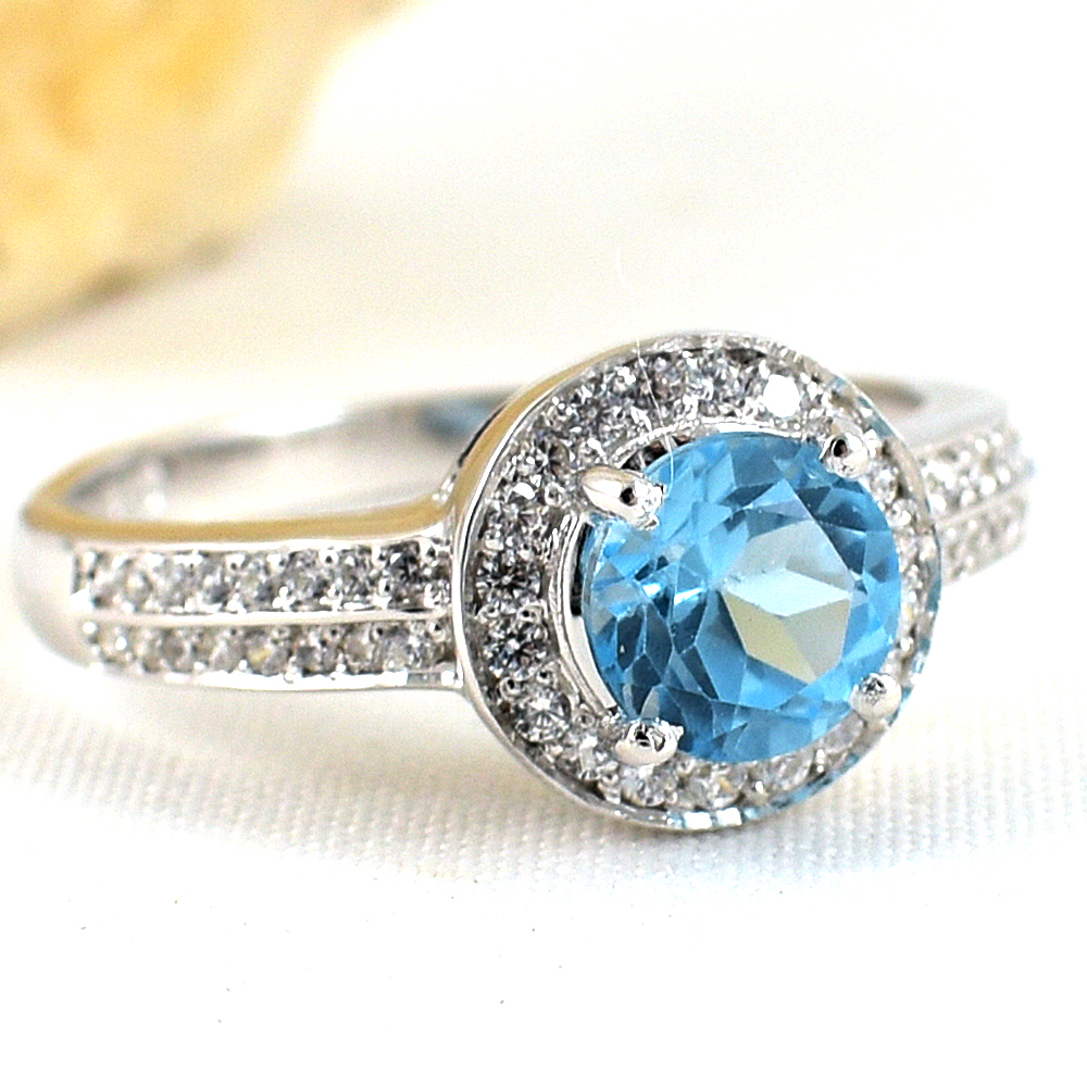 แหวนเงินแท้ราคาถูกชุบทองคำขาว สวิสบลูโทปาซแท้ 1.65 กะรัต เพชรCZ 0.51 กะรัต งานประณีตสวยงาม สั่งผลิตค่ะ