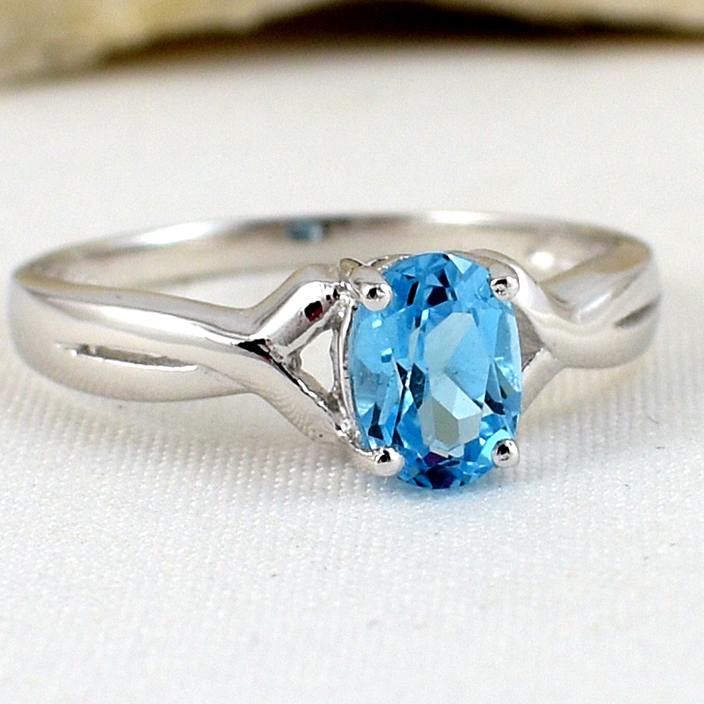 แหวนเงินแท้ราคาถูกชุบทองคำขาว สวิสบลูโทปาซแท้ 0.95 กะรัต งานประณีตสวยงาม สั่งผลิตค่ะ