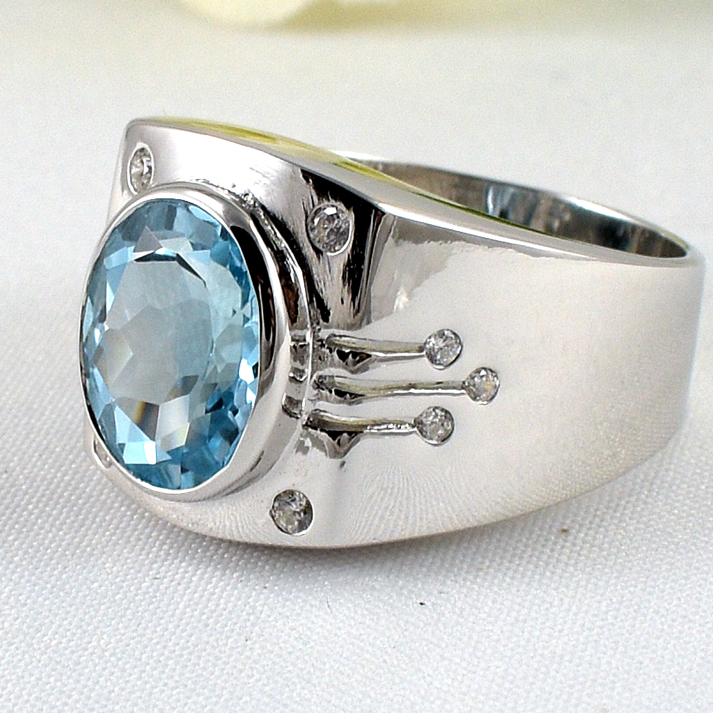 แหวนเงินแท้ราคาถูกชุบทองคำขาว สกายบลูโทปาซแท้ 6.0 กะรัต เพชรCZ 0.19 กะรัต งานประณีตสวยงาม สั่งผลิตค่ะ