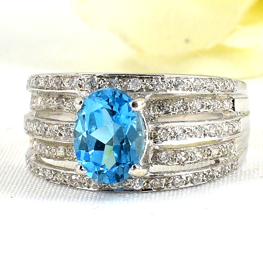 แหวนเงินแท้ราคาถูกชุบทองคำขาว สวิสบลูโทปาซแท้ 1.85 กะรัต เพชรCZ 0.62 กะรัต งานประณีตสวยงาม สั่งผลิตค่ะ