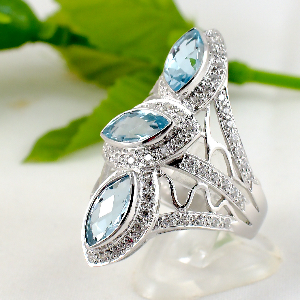 แหวนเงินแท้ราคาถูกชุบทองคำขาว สวิสบลูโทปาซแท้ 3.60 กะรัต เพชรCZ 0.79 กะรัต งานประณีตสวยงาม สั่งผลิตค่ะ