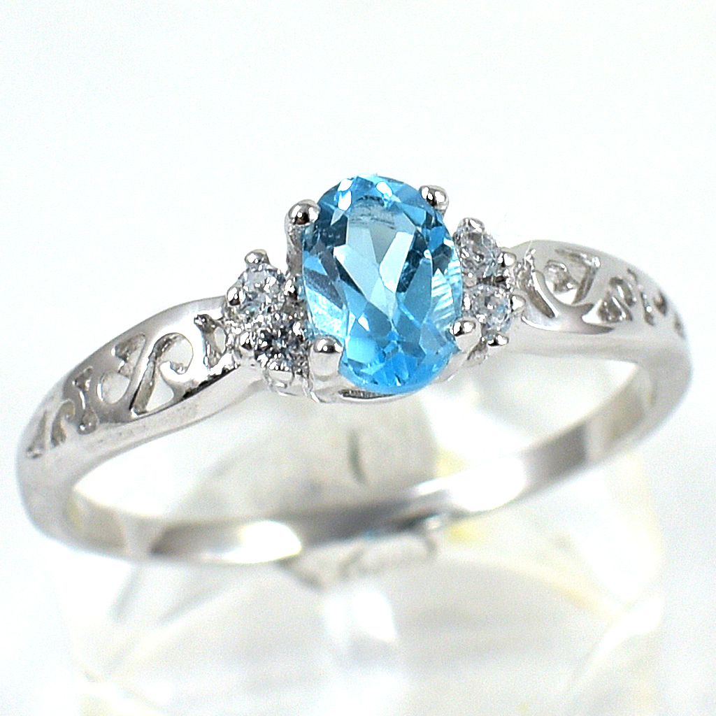 แหวนเงินแท้ราคาถูกชุบทองคำขาว สวิสบลูโทปาซแท้ 0.65 กะรัต เพชรCZ 0.04 กะรัต งานประณีตสวยงาม สั่งผลิตค่ะ