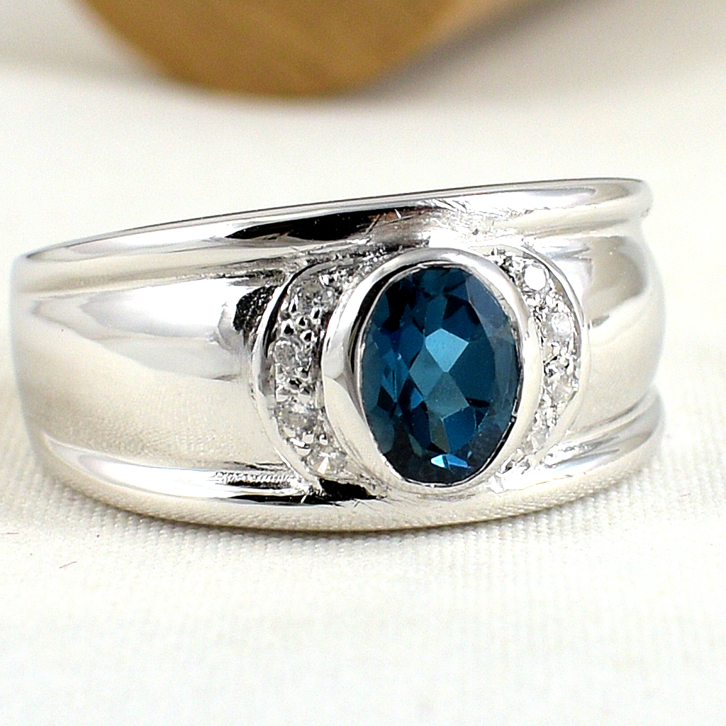 แหวนเงินแท้ราคาถูกชุบทองคำขาว ลอนดอนบลูโทปาซแท้ 0.95 กะรัต เพชรCZ 0.08 กะรัต งานประณีตสวยงาม สั่งผลิตค่ะ