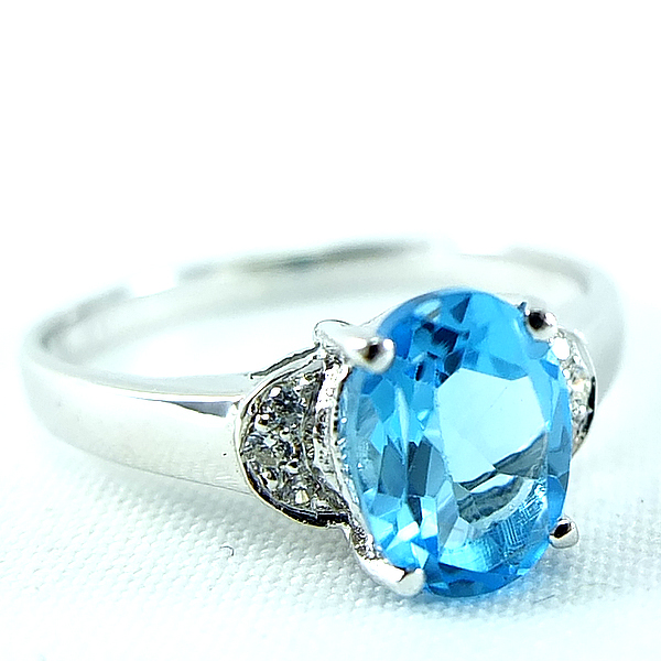 แหวนเงินแท้ราคาถูกชุบทองคำขาว สวิสบลูโทปาซแท้ 1.60 กะรัต เพชรCZ 0.048 กะรัต งานประณีตสวยงาม สั่งผลิตค่ะ