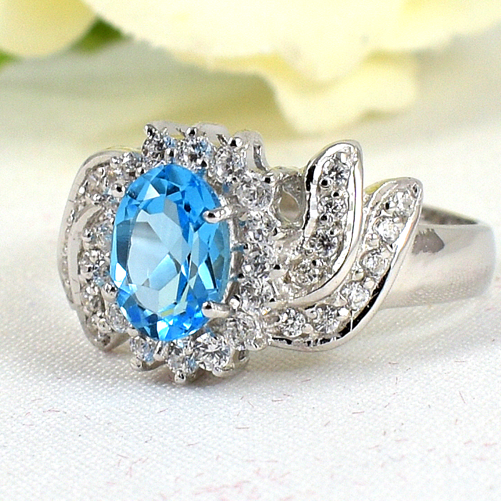 แหวนเงินแท้ราคาถูกชุบทองคำขาว สวิสบลูโทปาซแท้ 1.85 กะรัต เพชรCZ 0.44 กะรัต งานประณีตสวยงาม สั่งผลิตค่ะ