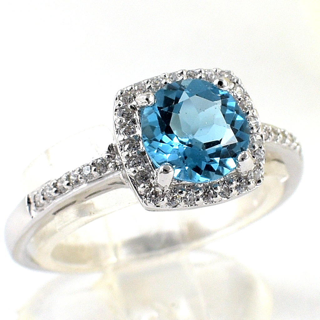 แหวนเงินแท้ราคาถูกชุบทองคำขาว สวิสบลูโทปาซแท้ 1.65 กะรัต เพชรCZ 0.252 กะรัต งานประณีตสวยงาม สั่งผลิตค่ะ