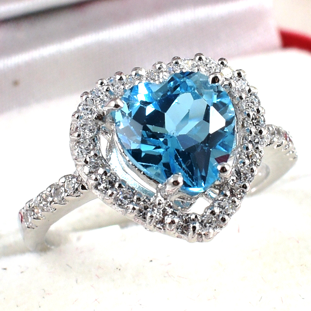 แหวนเงินแท้ราคาถูกชุบทองคำขาว สวิสบลูโทปาซแท้ 2.45 กะรัต เพชรCZ 0.252 กะรัต งานประณีตสวยงาม สั่งผลิตค่ะ