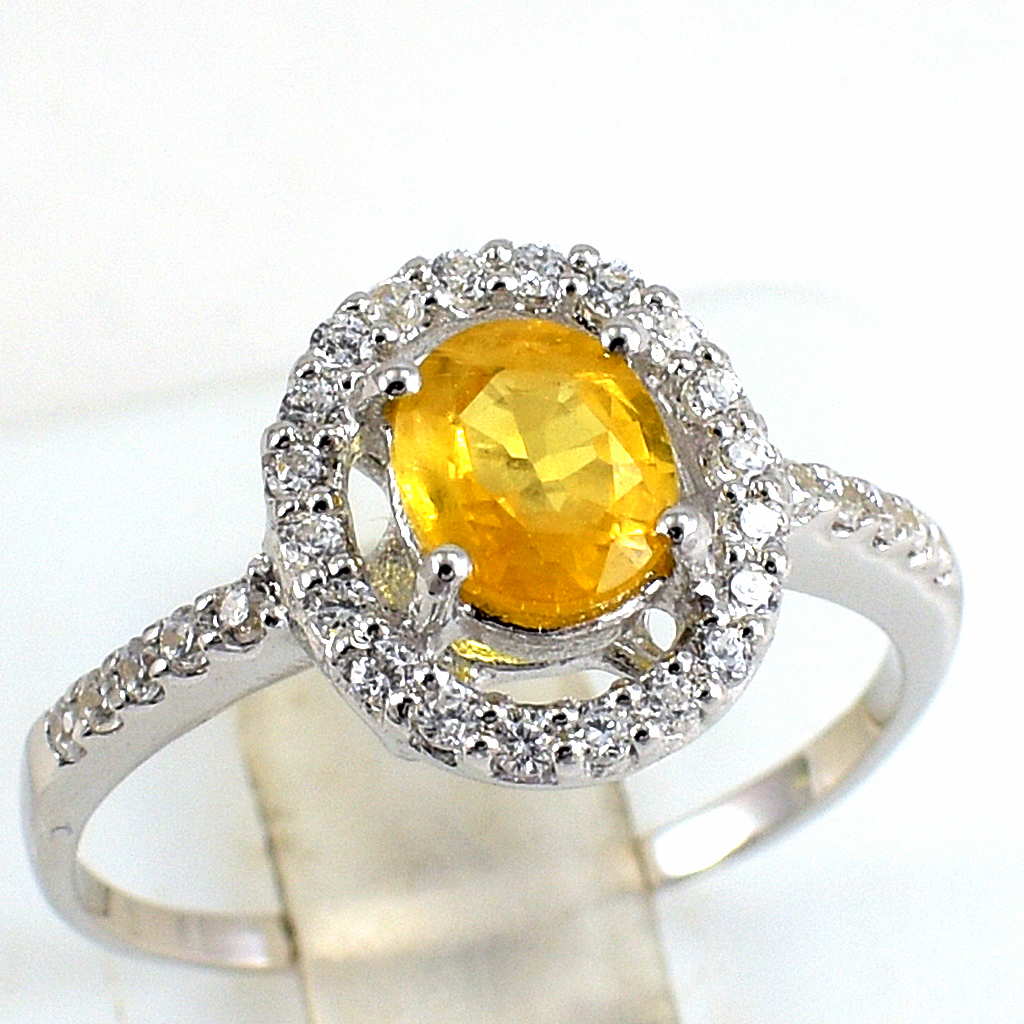 แหวนเงินแท้ราคาถูกชุบทองคำขาว บุษราคัมแท้ 0.95 กะรัต เพชรCZ 0.30 กะรัต งานประณีตสวยงาม สั่งผลิตค่ะ