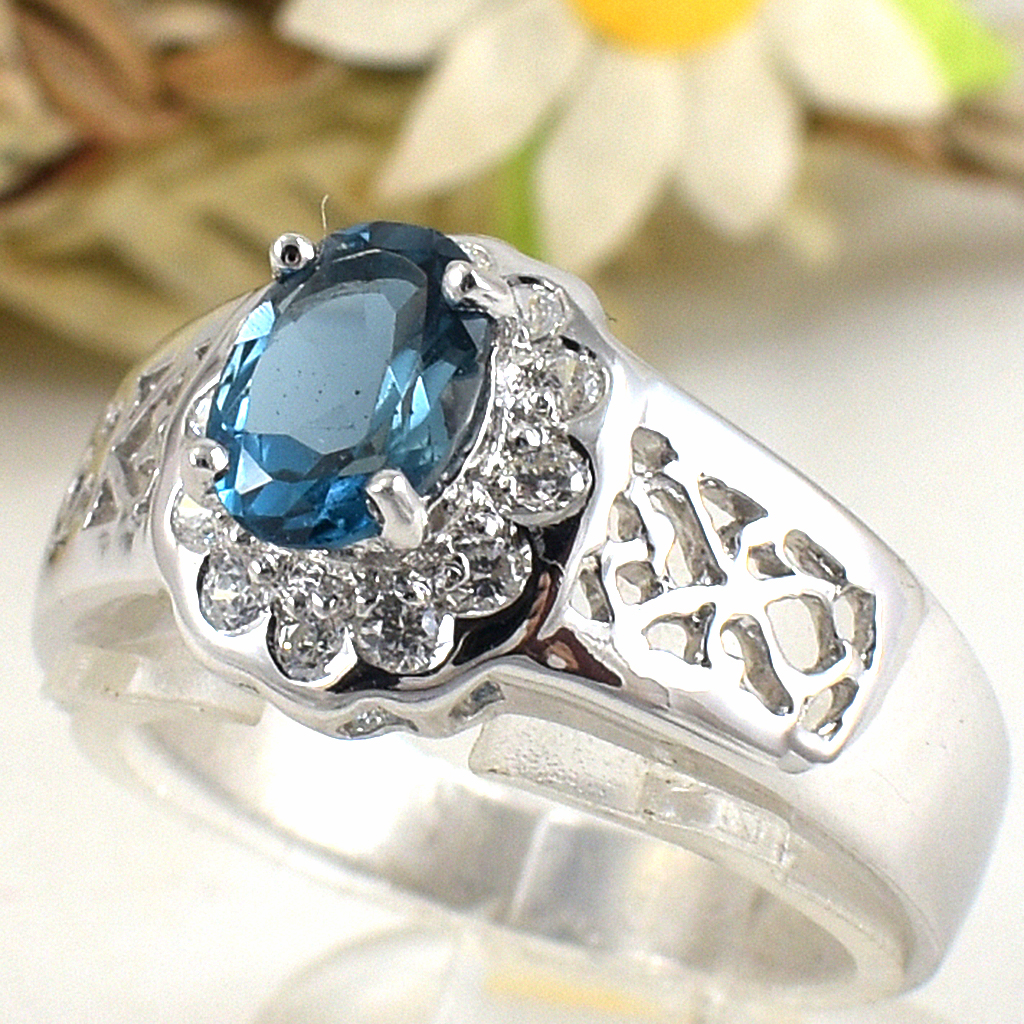 แหวนเงินแท้ราคาถูกชุบทองคำขาว ลอนดอนบลูโทปาซแท้ 0.95 กะรัต เพชรCZ 0.18 กะรัต งานประณีตสวยงาม สั่งผลิตค่ะ