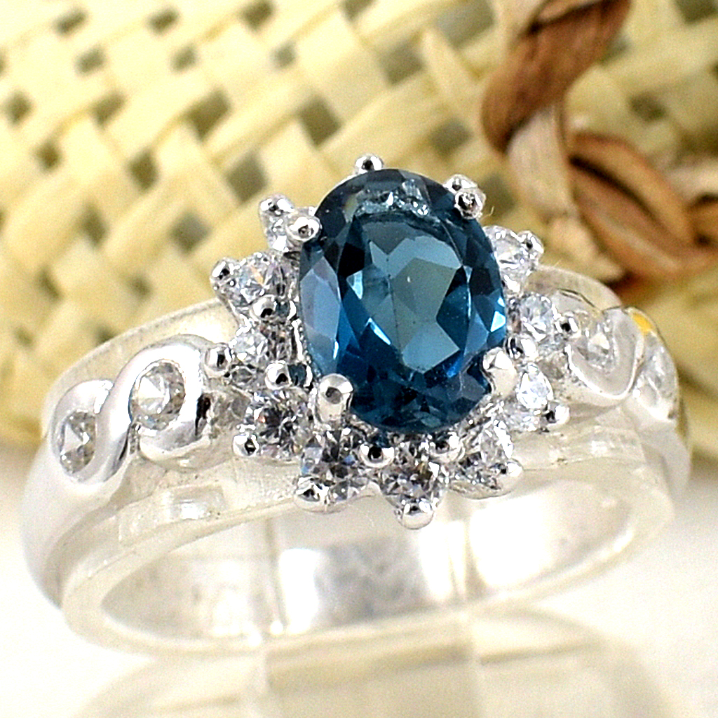 แหวนเงินแท้ราคาถูกชุบทองคำขาว ลอนดอนบลูโทปาซแท้ 0.95 กะรัต เพชรCZ 0.40 กะรัต งานประณีตสวยงาม สั่งผลิตค่ะ