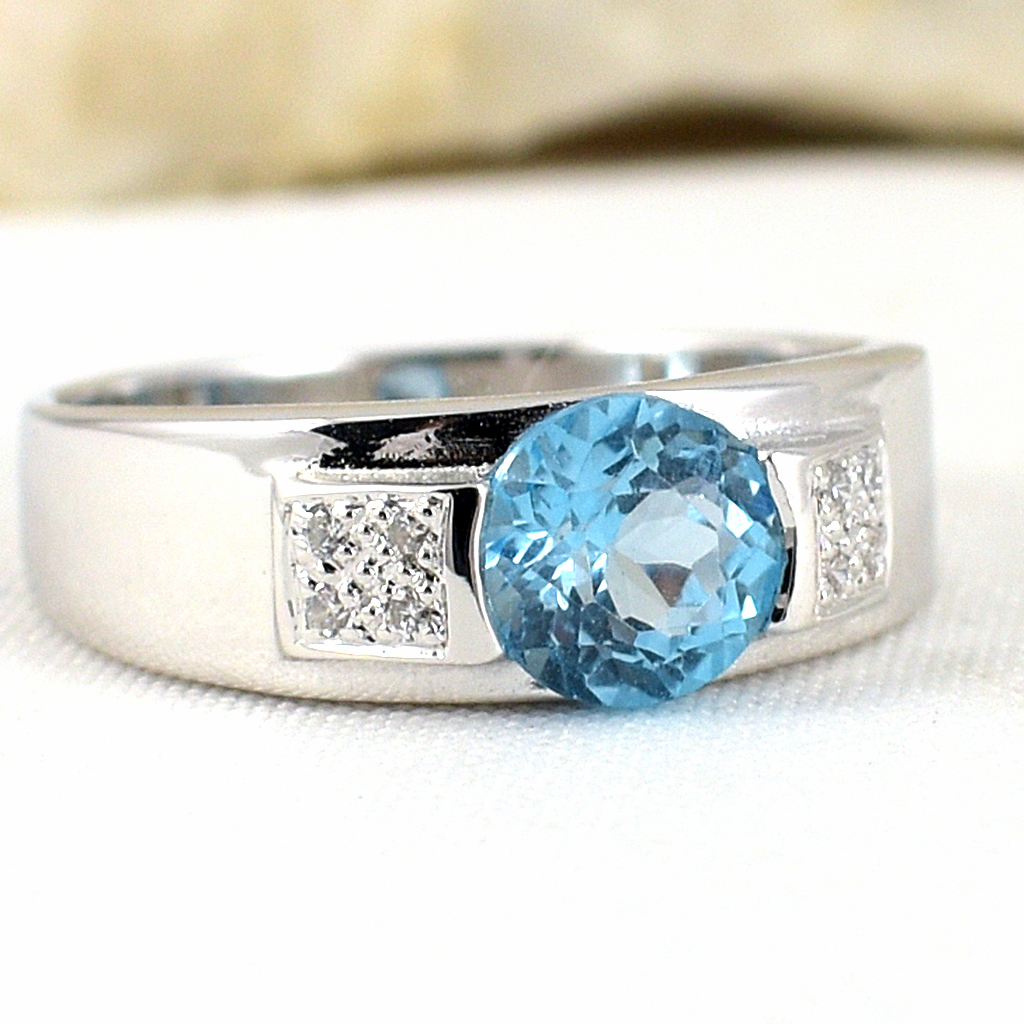 แหวนเงินแท้ราคาถูกชุบทองคำขาว สวิสบลูโทปาซแท้ 1.0 กะรัต เพชรCZ 0.056 กะรัต งานประณีตสวยงาม สั่งผลิตค่ะ