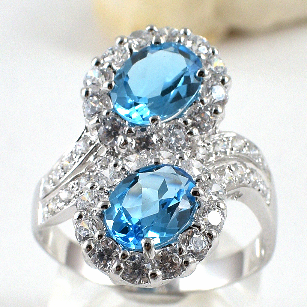 แหวนเงินแท้ราคาถูกชุบทองคำขาว สวิสบลูโทปาซแท้ 3.70 กะรัต เพชรCZ 1.23 กะรัต งานประณีตสวยงาม สั่งผลิตค่ะ