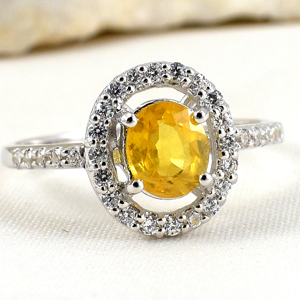 แหวนเงินแท้ราคาถูกชุบทองคำขาว บุษราคัมแท้ 0.95 กะรัต เพชรCZ 0.30 กะรัต งานประณีตสวยงาม สั่งผลิตค่ะ